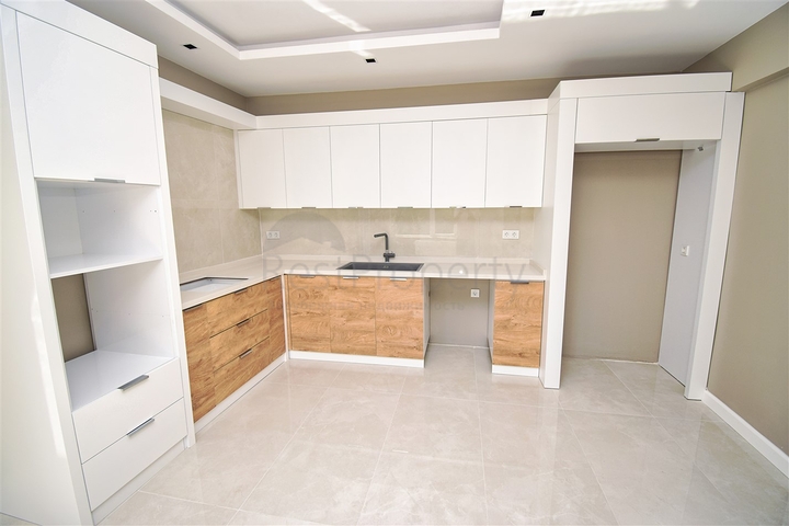 Квартира планировки 3+1 в микрорайоне Гюрсу - Анталия 