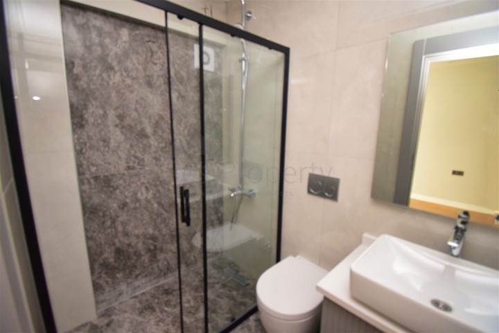 Квартира планировки 3+1 в микрорайоне Гюрсу - Анталия 