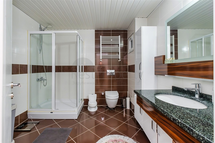 Квартира планировки 3+1 в центре города Анталия 