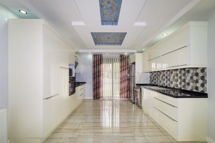 Вилла планировки 5+1 в микрорайоне Гюзельоба - Анталия 