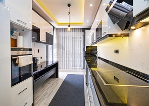 Квартира планировки 3+1 дуплекс в микрорайоне Енигюн - Анталия 