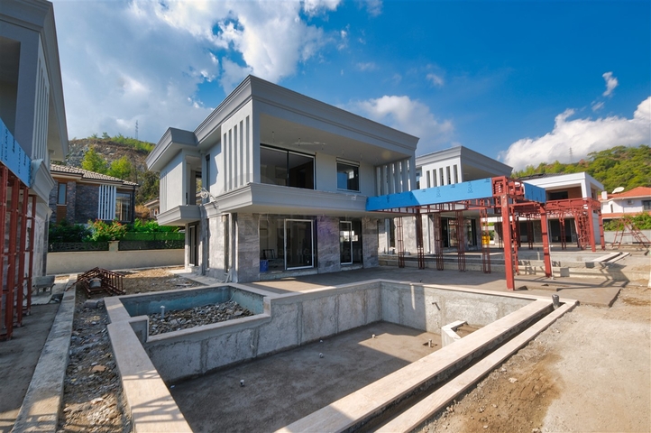 Вилла планировки 3+1 в районе Кемер - Анталия 