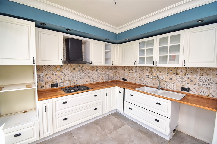 Квартира планировки 4+1 в микрорайоне Улуч - Анталия 