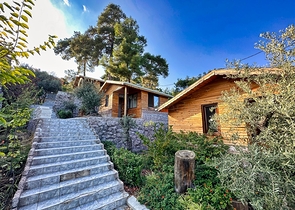 На продажу выставлен отель, включающий 20 номеров и 10 бунгало в живописном районе Коньяалты - Анталия  