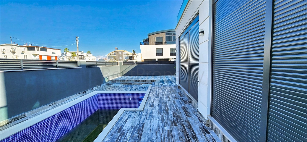 Вилла планировки 5+1 в микрорайоне Гюзельоба - Анталия 