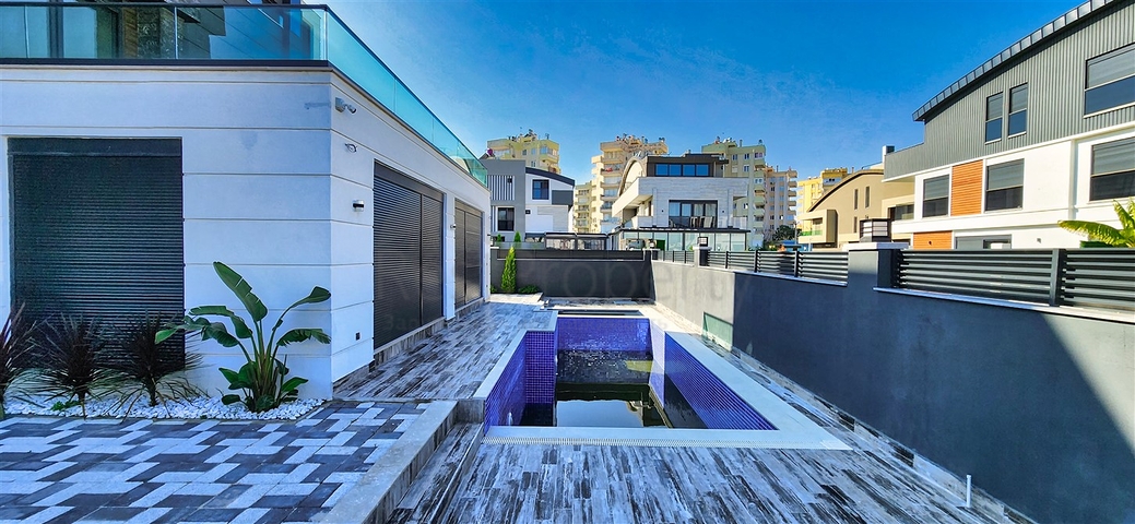 Вилла планировки 5+1 в микрорайоне Гюзельоба - Анталия 