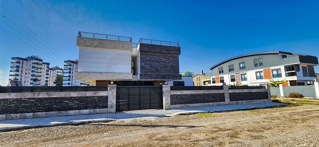 Вилла планировки 5+1 в микрорайоне Гюзельоба - Анталия 