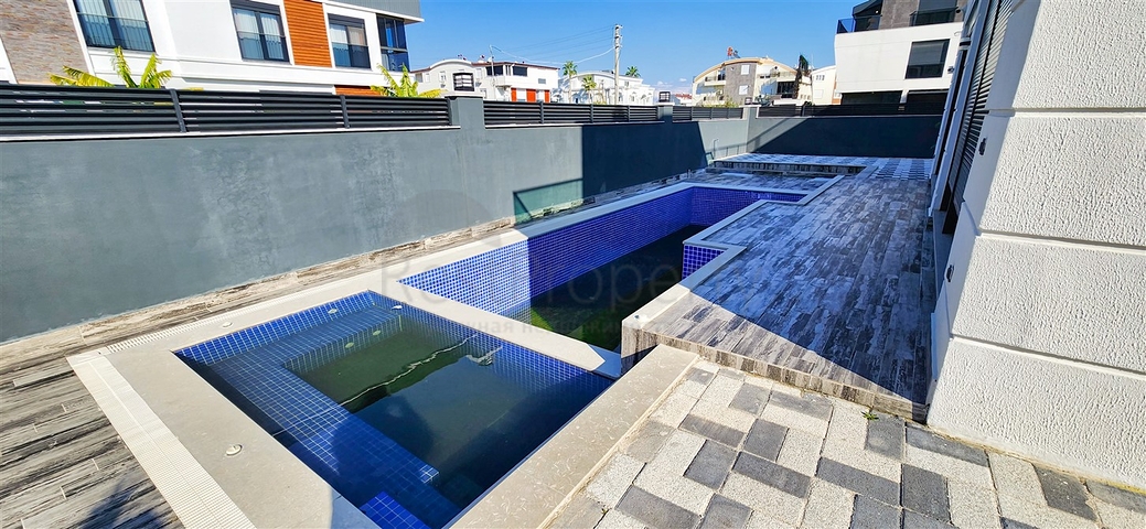 Вилла планировки 5+1 в микрорайоне Гюзельоба - Анталия 