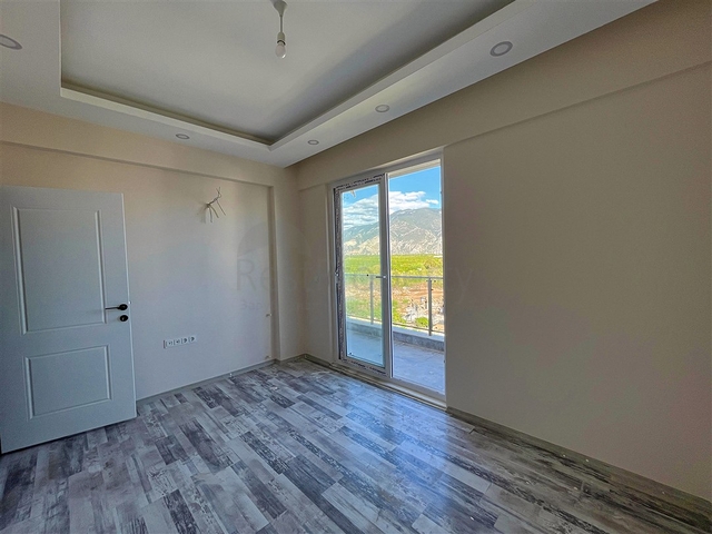 Квартира планировки 1+1 в районе Финике - Анталия 