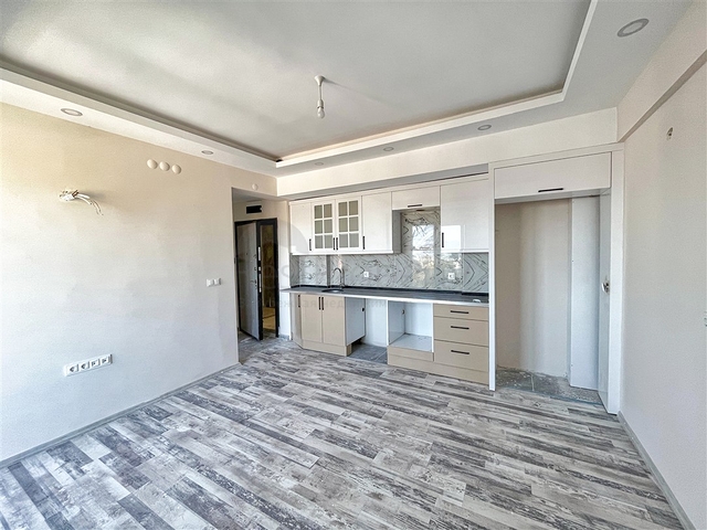 Квартира планировки 1+1 в районе Финике - Анталия 