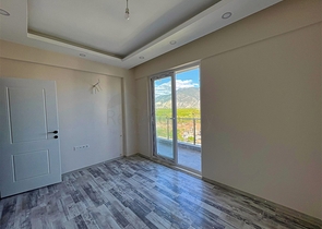 Квартира планировки 1+1 в районе Финике - Анталия 