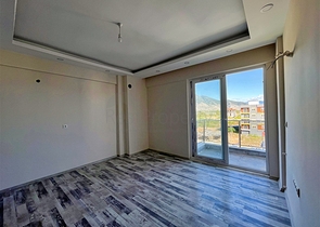 Квартира планировки 1+1 в районе Финике - Анталия 