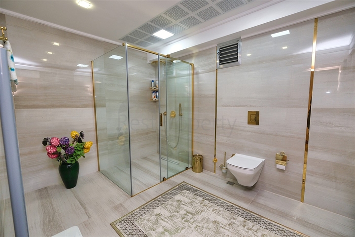 Квартира планировки 3+1 в районе Ешилбахче города Анталия 