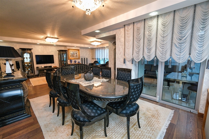 Квартира планировки 3+1 в районе Ешилбахче города Анталия 