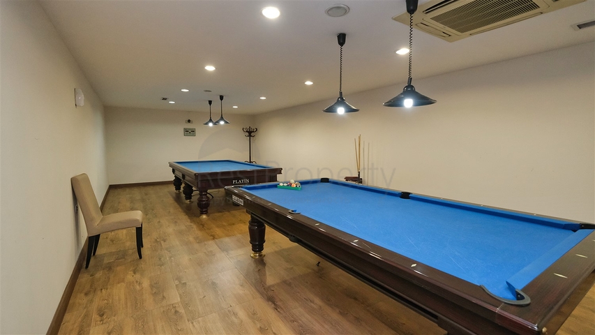 Квартира планировки 3+1 в районе Ешилбахче города Анталия 