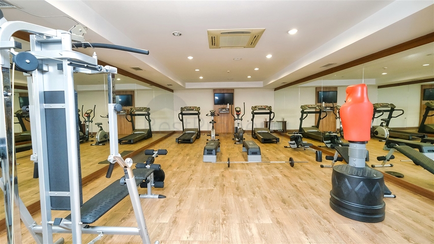 Квартира планировки 3+1 в районе Ешилбахче города Анталия 