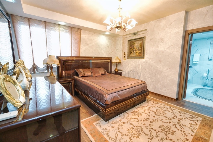 Квартира планировки 3+1 в районе Ешилбахче города Анталия 