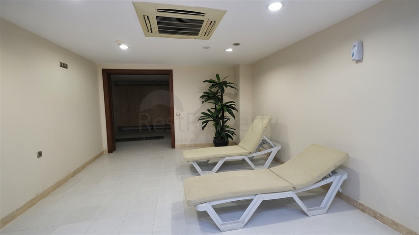 Квартира планировки 3+1 в районе Ешилбахче города Анталия 