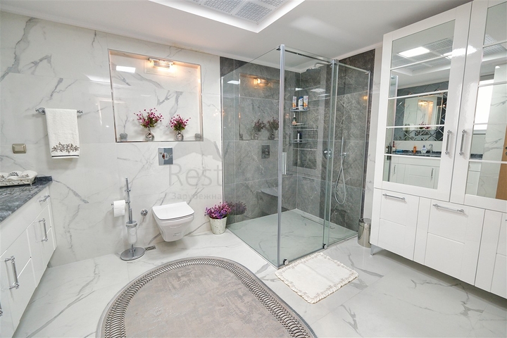 Квартира планировки 3+1 в районе Ешилбахче города Анталия 