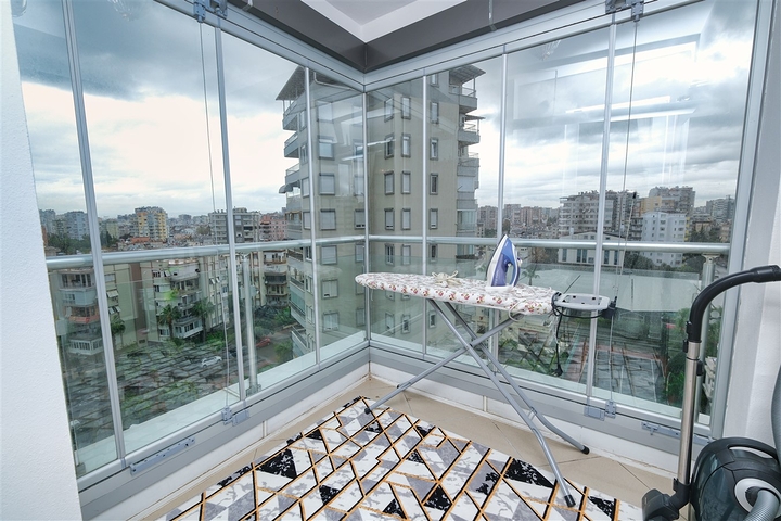 Квартира планировки 3+1 в районе Ешилбахче города Анталия 