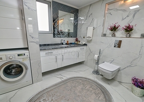 Квартира планировки 3+1 в районе Ешилбахче города Анталия 