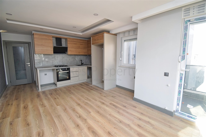 Квартира планировки 2+1 в центре города Анталия 