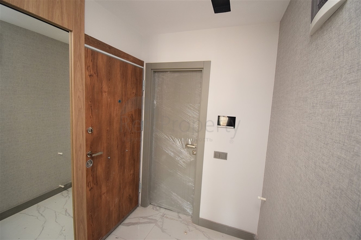 Квартира планировки 2+1 в центре города Анталия 