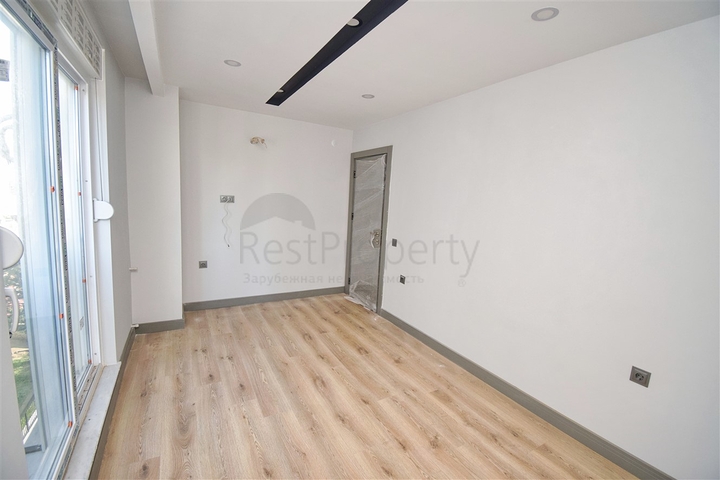 Квартира планировки 2+1 в центре города Анталия 