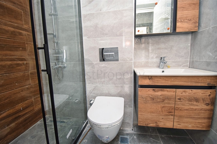 Квартира планировки 2+1 в центре города Анталия 