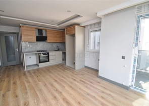 Квартира планировки 2+1 в центре города Анталия 