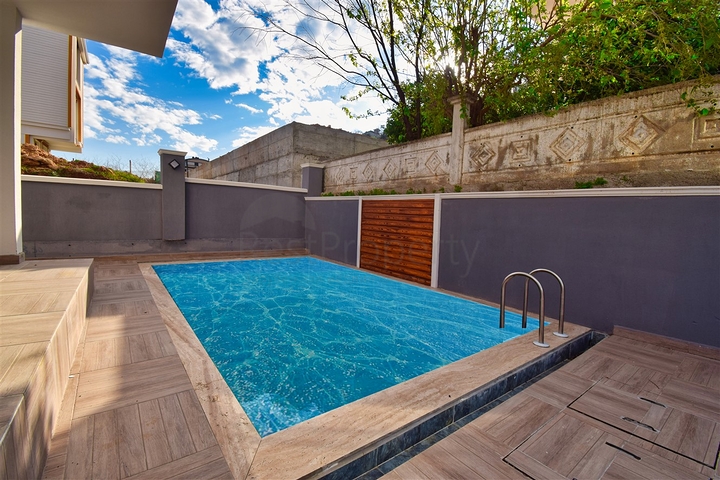 Вилла планировки 4+1 в микрорайоне Эрменек - Анталия 