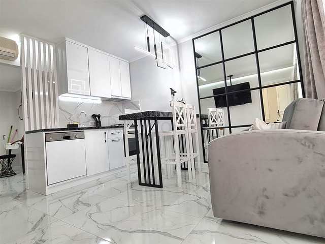 Квартира планировки 4+1 дуплекс в районе Кемер - Анталия 