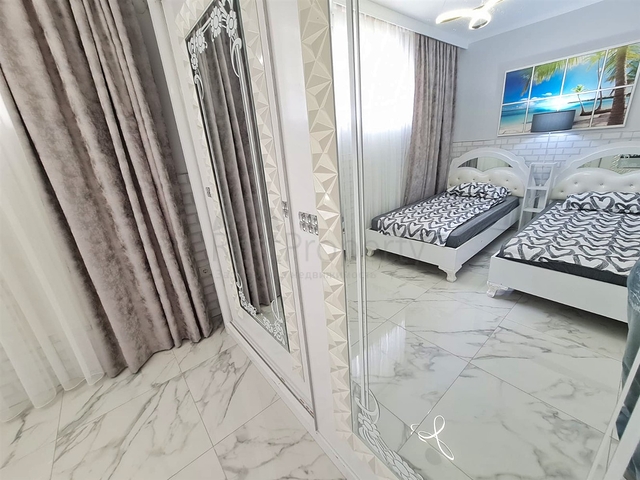 Квартира планировки 4+1 дуплекс в районе Кемер - Анталия 