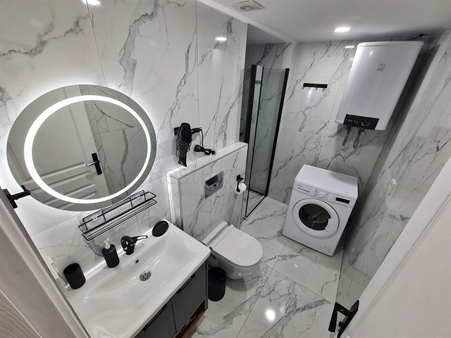 Квартира планировки 4+1 дуплекс в районе Кемер - Анталия 