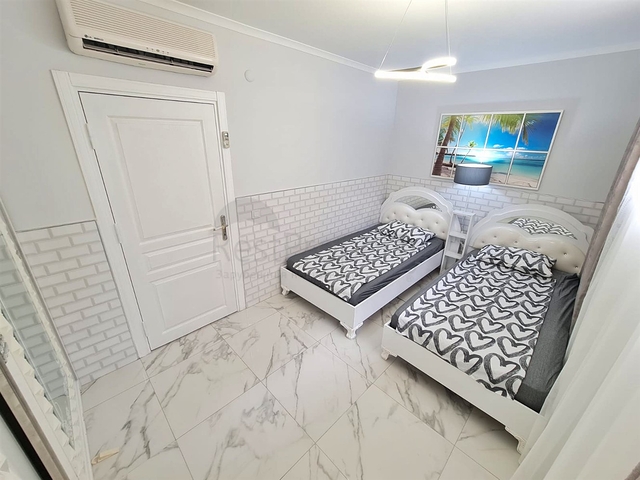 Квартира планировки 4+1 дуплекс в районе Кемер - Анталия 