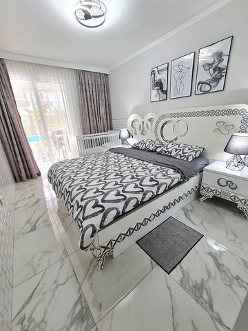 Квартира планировки 4+1 дуплекс в районе Кемер - Анталия 