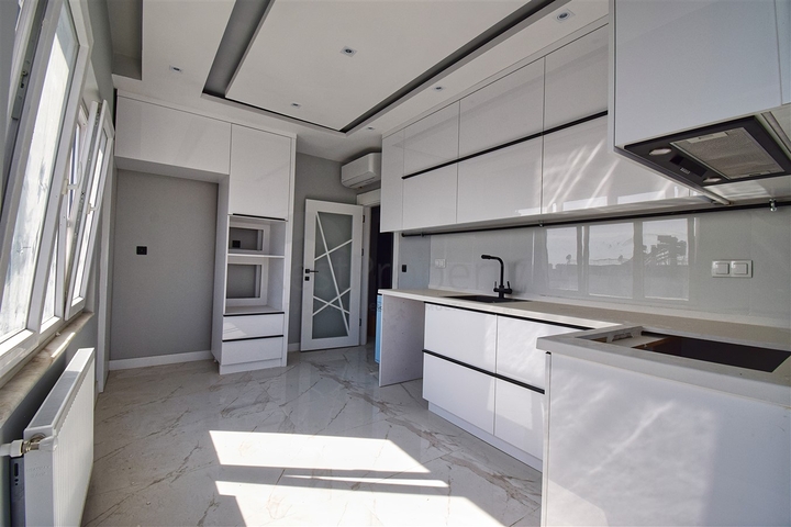 Квартира планировки 3+1 в микрорайоне Алтынкум - Анталия 