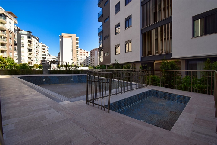 Квартиры планировки 2+1 и 3+1 в микрорайоне Унджалы - Анталия 