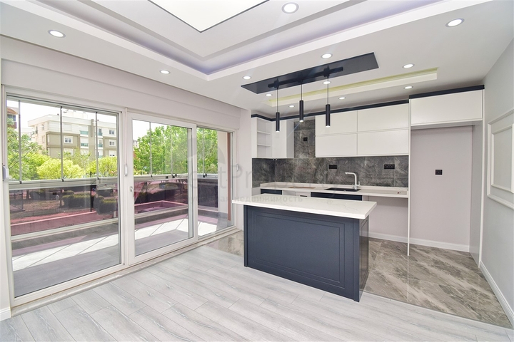 Квартира планировки 3+1 в микрорайоне Кызылтопрак - Анталия 