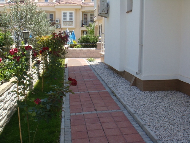 Апартаменты с 2 спальнями  в уютном комплексе в Фетхие.