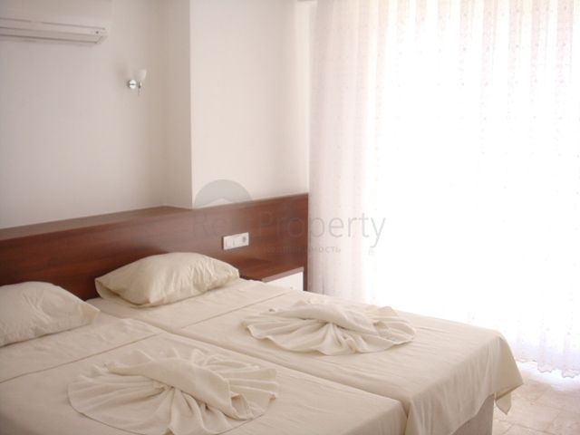 Апартаменты с 2 спальнями  в уютном комплексе в Фетхие.