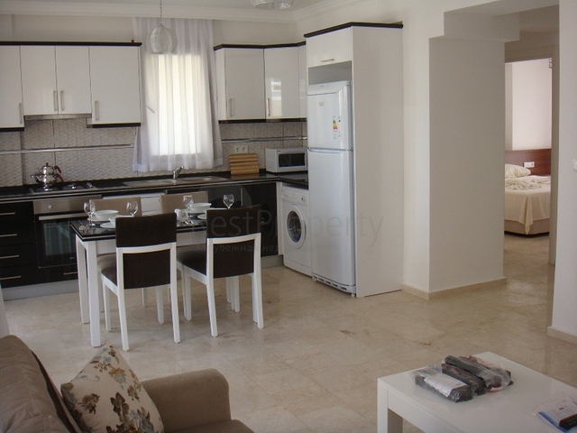 Апартаменты с 2 спальнями  в уютном комплексе в Фетхие.