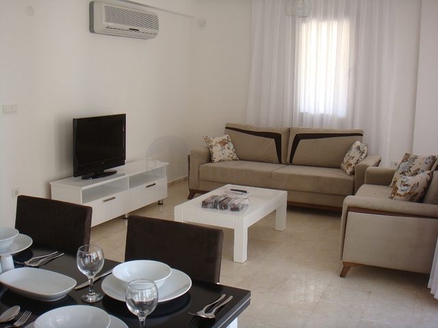 Апартаменты с 2 спальнями  в уютном комплексе в Фетхие.