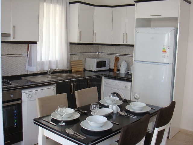 Апартаменты с 2 спальнями  в уютном комплексе в Фетхие.