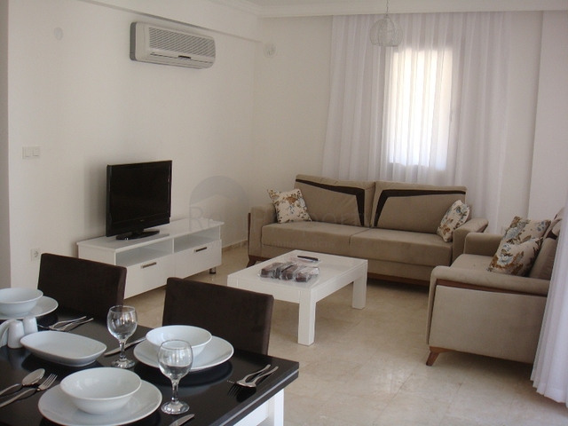 Апартаменты с 2 спальнями  в уютном комплексе в Фетхие.