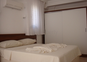 Апартаменты с 2 спальнями  в уютном комплексе в Фетхие.