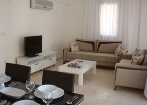 Апартаменты с 2 спальнями  в уютном комплексе в Фетхие.