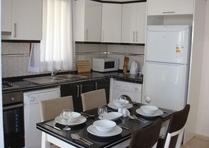 Апартаменты с 2 спальнями  в уютном комплексе в Фетхие.