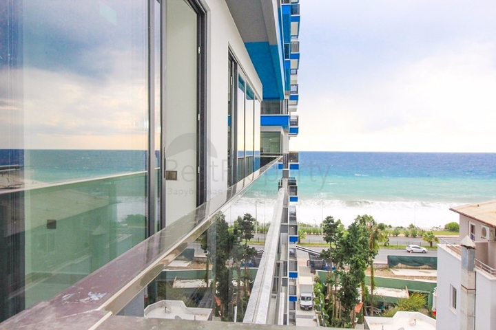 Квартира 1+1 на первой линии в Махмутлар