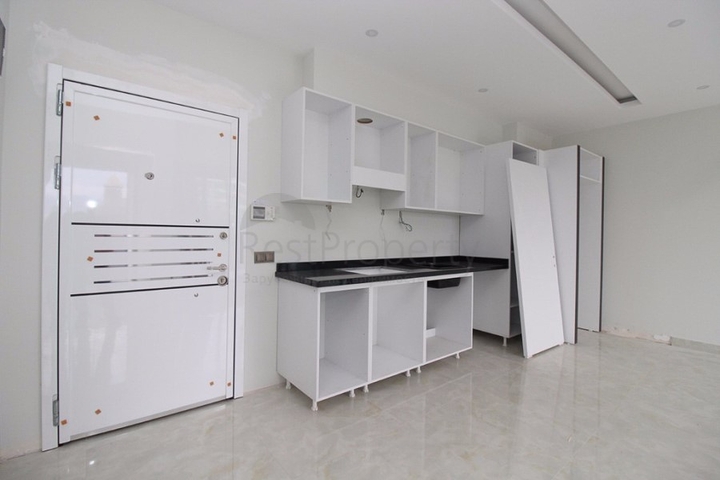 Квартира 1+1 на первой линии в Махмутлар